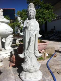 Kwan Yin Statue carving Sculpture Garden carving photo image