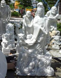 Kwanyin and Dragon Statue carving Sculpture Garden carving photo image